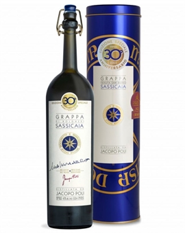 Blå gavetube med guldtryk og slank flaske Grappa di Sassicaia fra Poli
